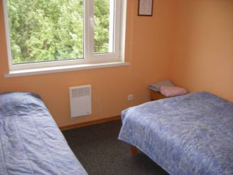 Двухместный номер с 2 отдельными кроватями и общей ванной комнатой – специальное предложение
